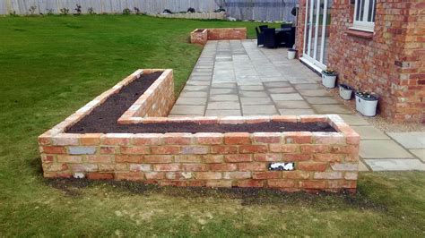 Are bricks safe for raised beds?