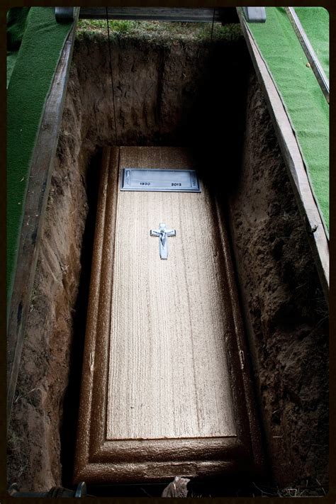 Are coffins buried in cement?