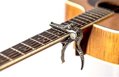 Are guitar capos different?