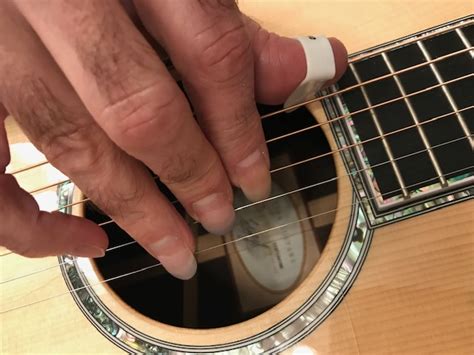 Are nails important for guitar?