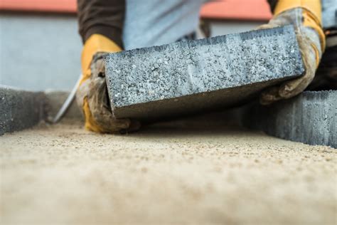 Are pavers cheaper than concrete?