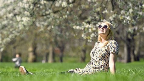 Are people happier in warm weather?