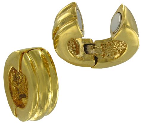 Are real gold earrings magnetic?