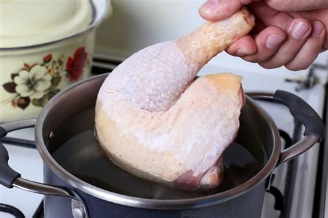 Can I boil frozen chicken before frying?
