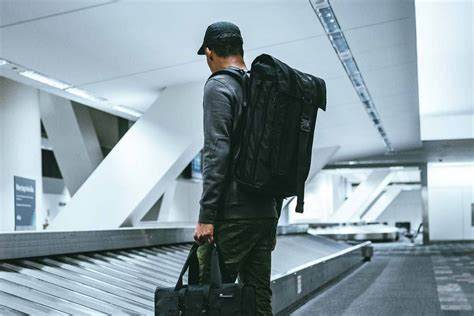 Can I carry 2 backpacks on a plane?