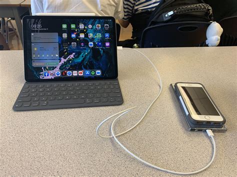 Can I charge my iPad with my phone?