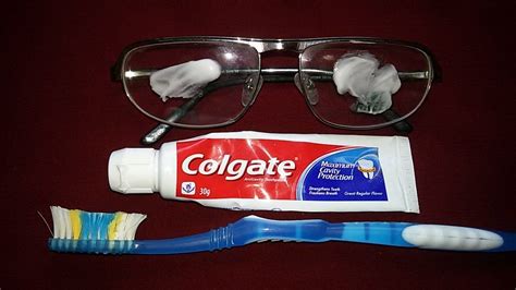 Can I clean my glasses with Colgate?