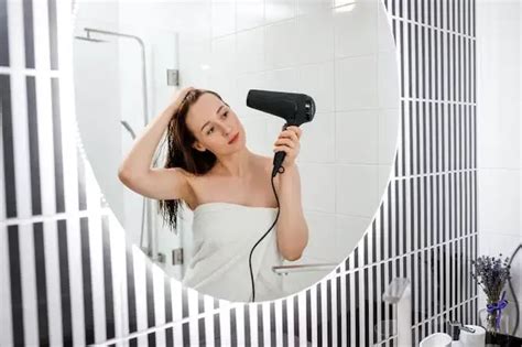 Can I dry my iPhone with a hair dryer?