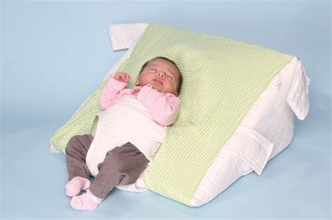 Can I elevate my baby on a pillow?