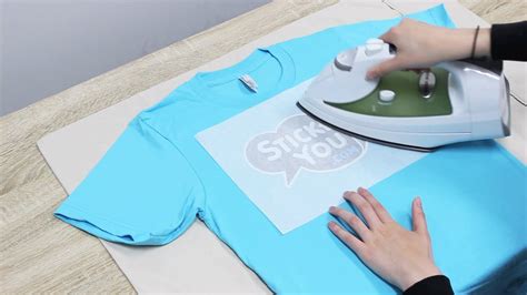 Can I hot glue paper to a shirt?