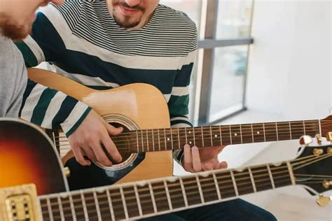 Can I learn guitar 1 hour a day?