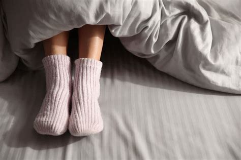 Can I sleep with socks on?
