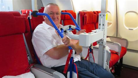 Can I stay in my wheelchair on a plane?