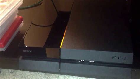 Can I turn my PS4 on its side?