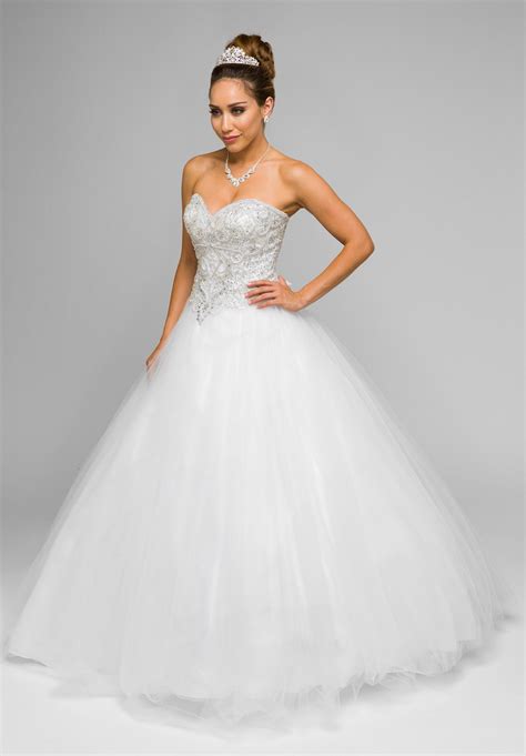 Can I wear a dress with white in it to a wedding?