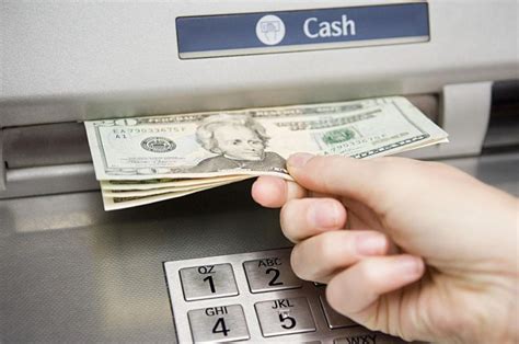 Can I withdraw money from a bank that isn't mine?