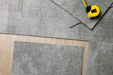 Can carpet tiles be laid without adhesive?