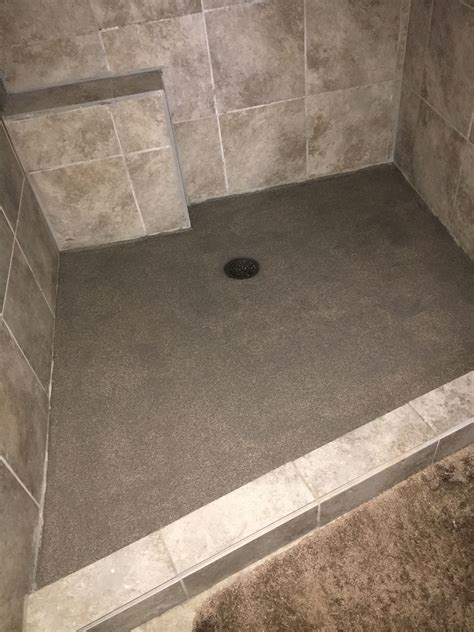 Can concrete be used for shower floor?