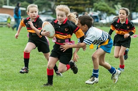 Can girls play rugby against boys?