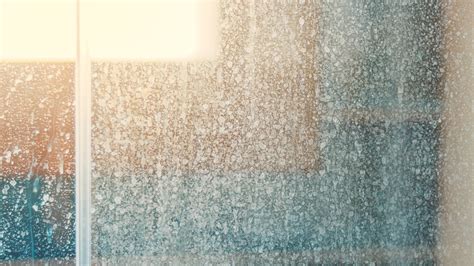 Can hard water stains be permanent on glass?