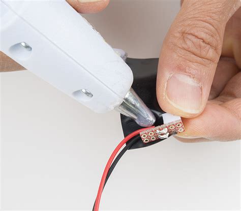 Can hot glue be used on electrical connections?
