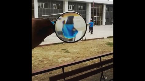 Can magnifying glass form inverted image?