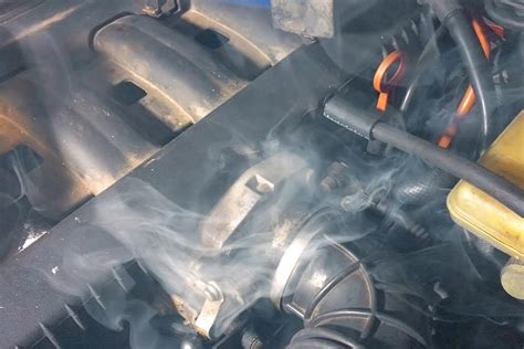 Can old oil make your car smoke?