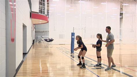Can the ball hit the wall in volleyball?