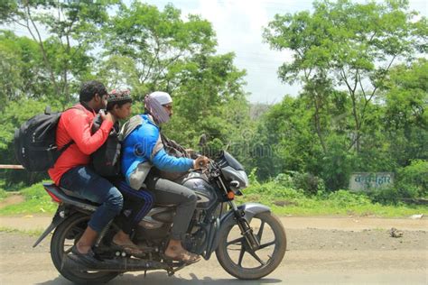 Can three people ride on a motorcycle in Florida?