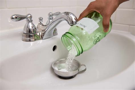 Can vinegar unclog a shower drain?