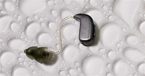 Can water damage a hearing aid?