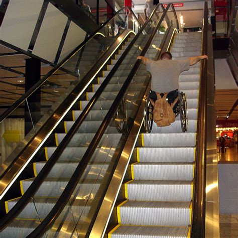 Can wheelchairs go on escalators?