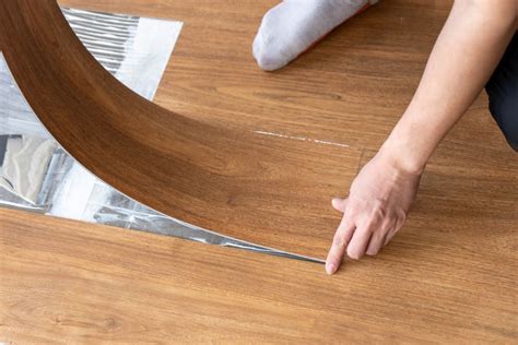 Can you Reglue vinyl plank flooring?