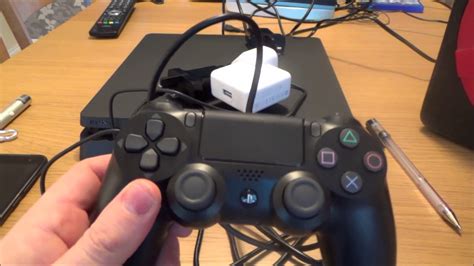 Can you charge a PS4 controller with a Iphone charger?