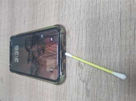 Can you clean an iPhone charging port with alcohol?