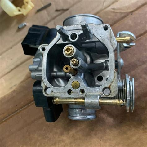 Can you clean generator carburetor without removing?