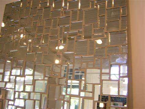 Can you glue mosaic tiles to a mirror?