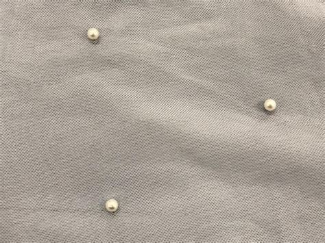 Can you glue pearls on tulle?