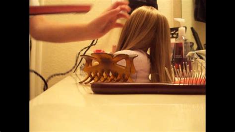 Can you iron a dolls hair?