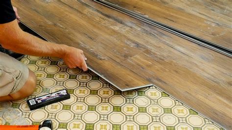 Can you lay laminate over vinyl without underlay?