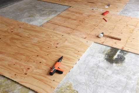 Can you lay plywood over concrete?