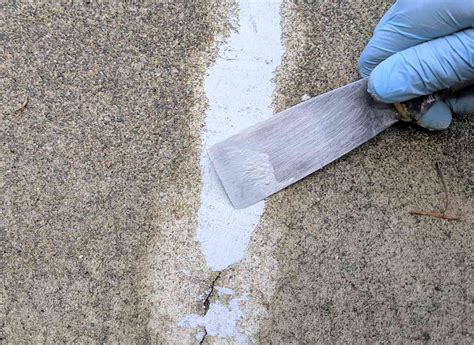 Can you paint over concrete crack filler?