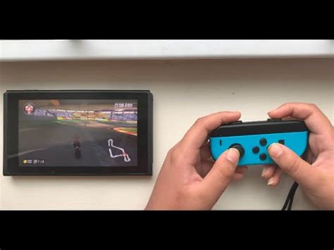 Can you play Mario Kart 2 player with one controller?