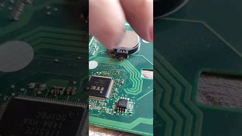 Can you put hot glue on a motherboard?