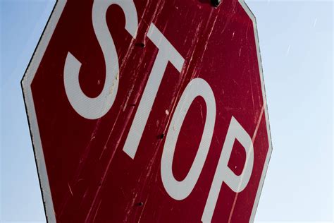 Can you roll stop signs in California?