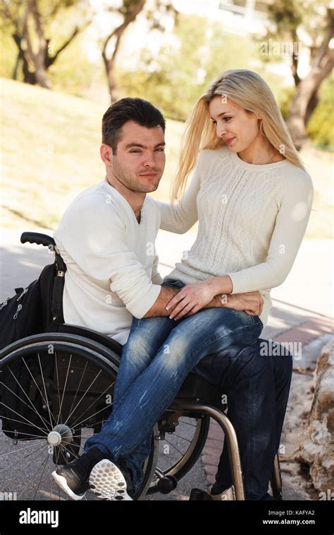 Can you sit on the lap of someone in a wheelchair?