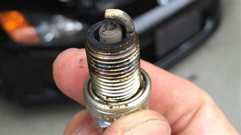 Can you smell a bad spark plug?