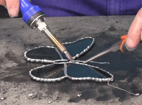 Can you solder glass to metal?