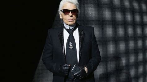 Did Karl Lagerfeld create the Chanel logo?