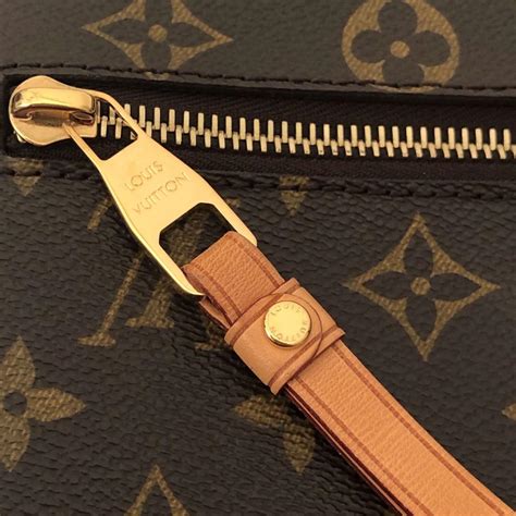 Did Louis Vuitton use YKK zippers?
